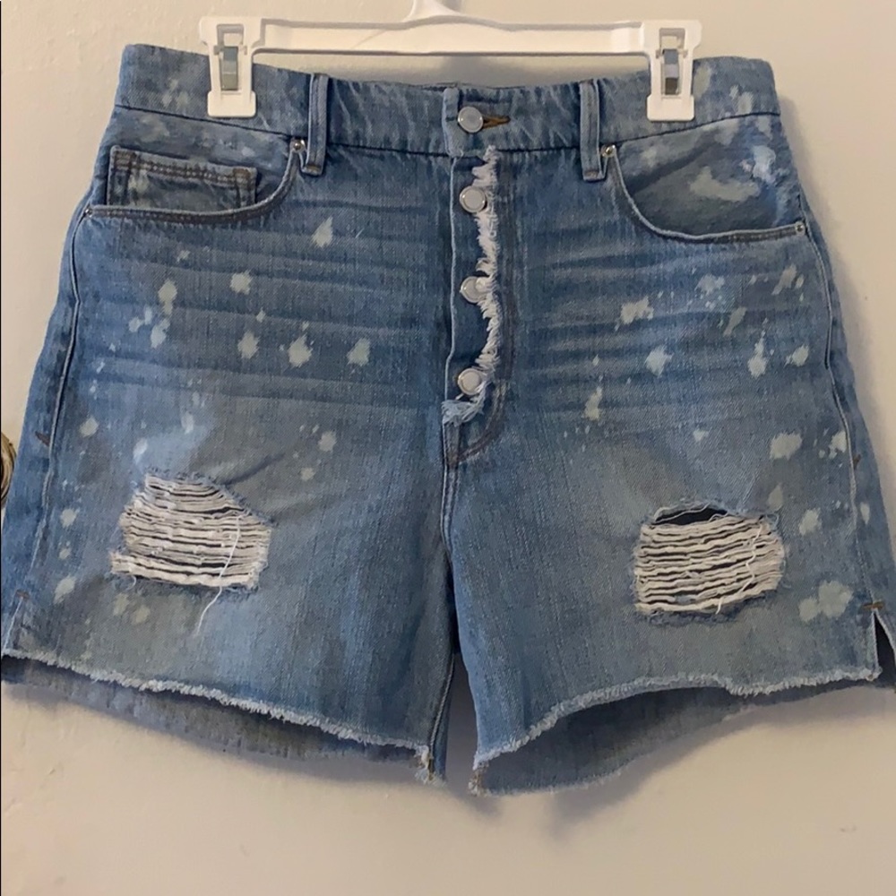 Good American distressed denim shorts